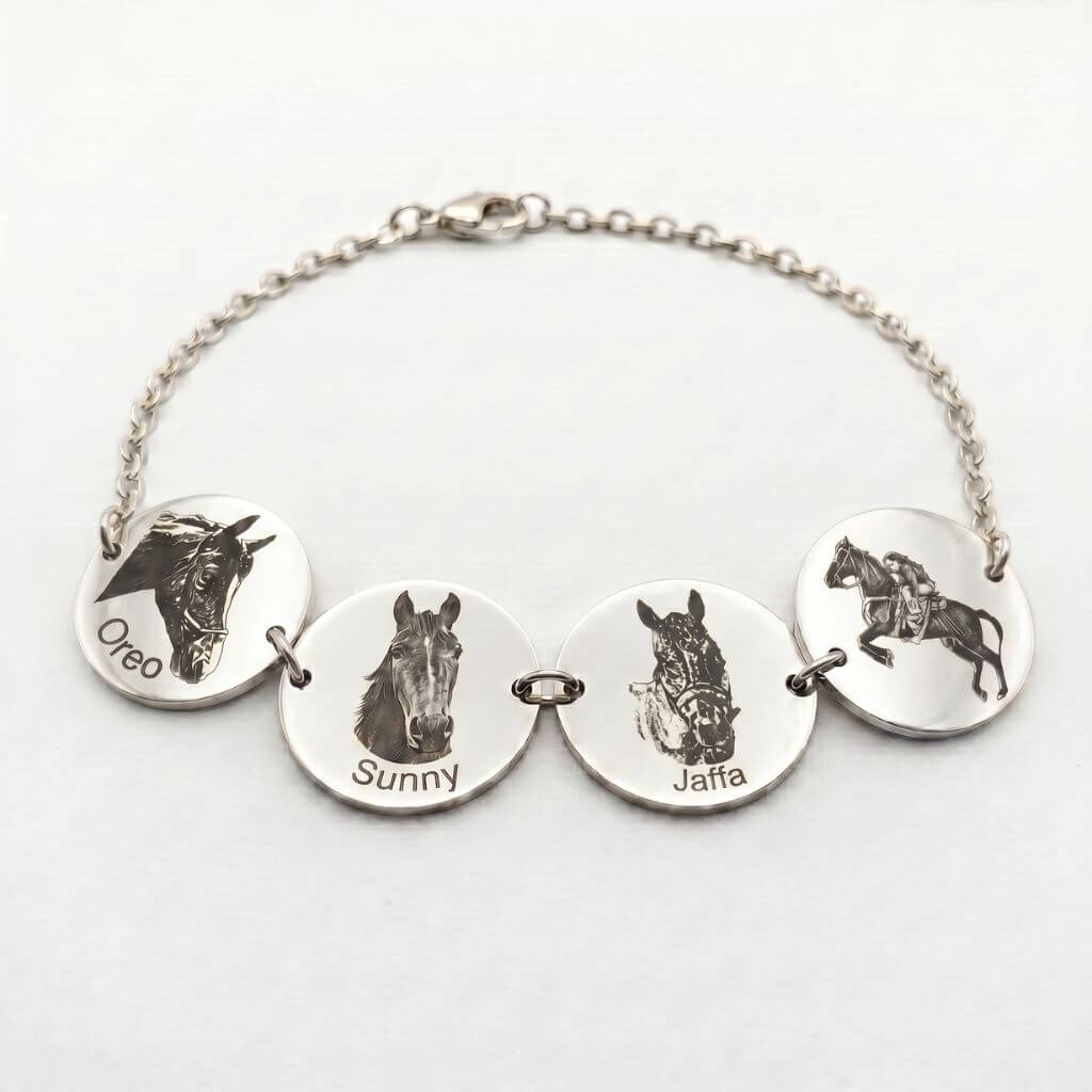 Silver bracelet with engraved horse images and names on round silver discs against a white background